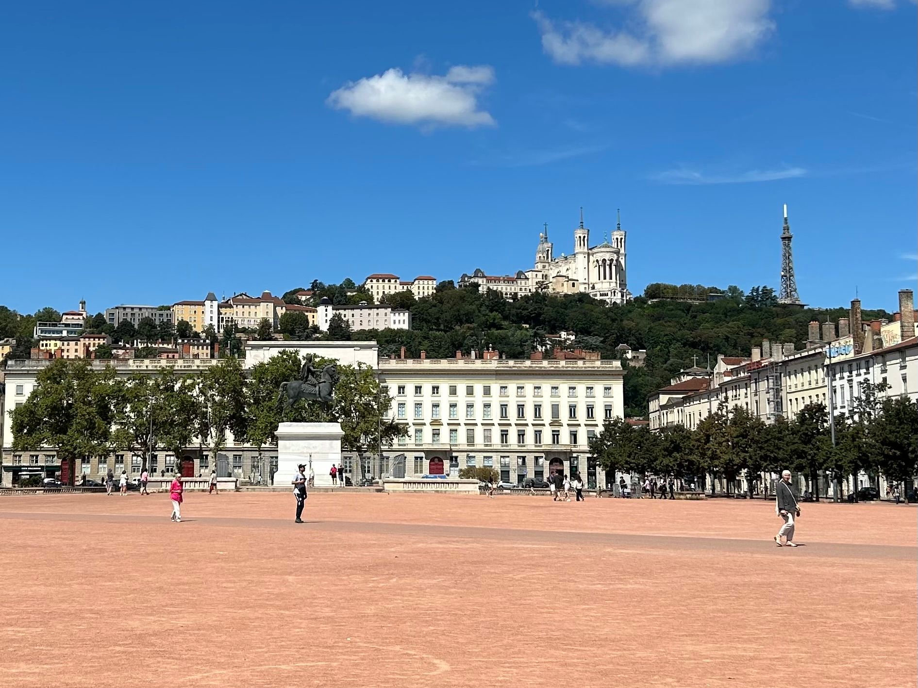 Place Bellecour in Lyon, with the statue of Louis XIV and Fourvière hill behind it.